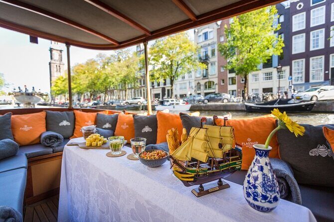 Amsterdam Small-Group Bike Tour With Canal Cruise, Drinks, Cheese - ARTIS Zoo outskirts and the narrowest bridge moment