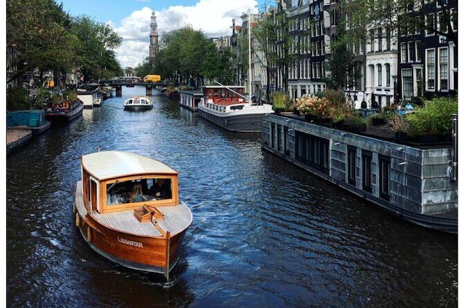 Amsterdam small-group canal cruise in 1920s saloon boat - Why the $72 price can feel fair (and when it might not)