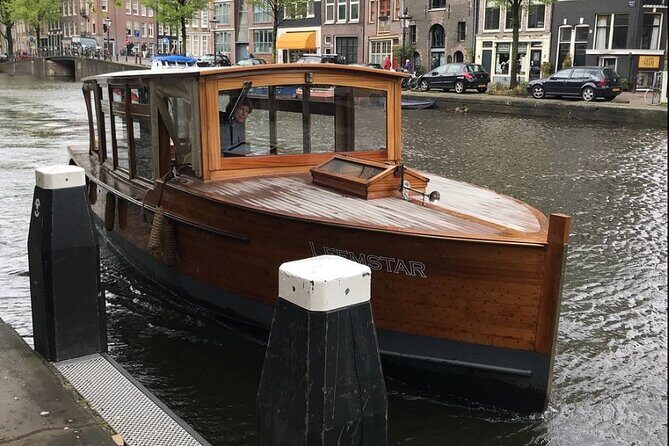 Amsterdam small-group canal cruise in 1920s saloon boat - Electric boat plus smaller canals near the Amstel River