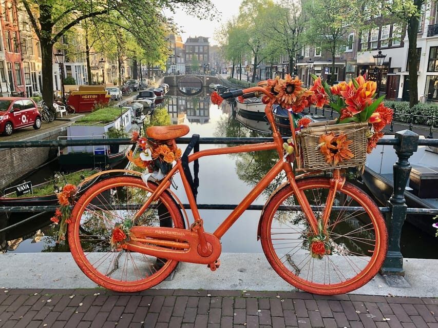Amsterdam: Small Group Walking Tour with Fun Guide - Getting Oriented at Dam Square and the National Monument