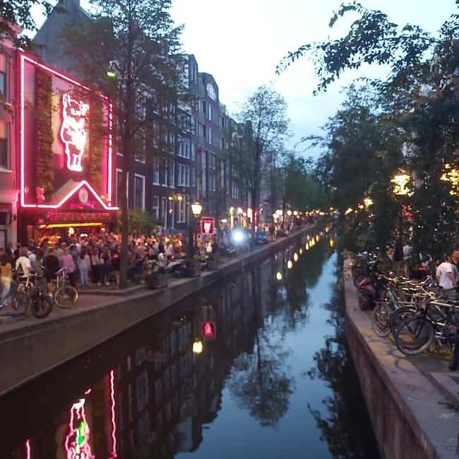 Amsterdam: Spanish Tour Unmasking the Redlight District - Why this walk starts near Central Station (St. Nicholas Basilica)