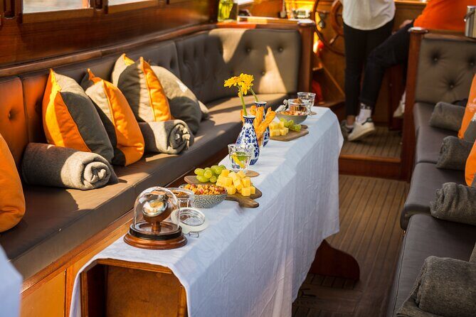 Amsterdam Walking Tour and Cruise with Drinks and Cheese Tasting - Getting Oriented: Beursplein to Amsterdam Centraal