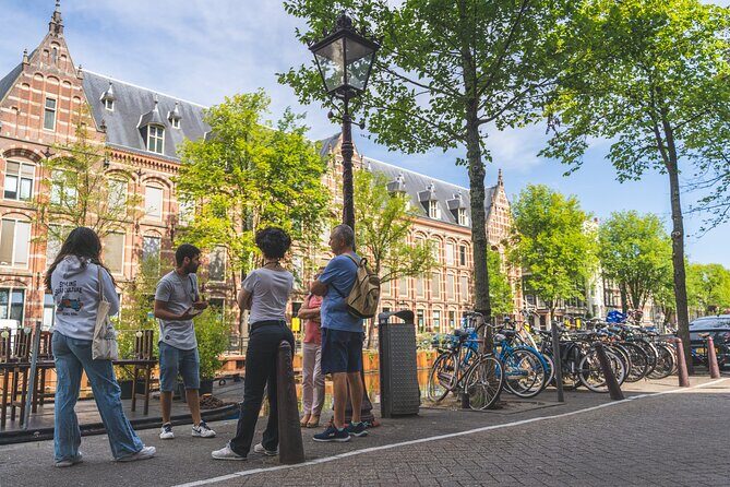 Amsterdam Walking Tour with Cheese Tasting - Old Amsterdam cheese store: five Gouda and wine pairing that actually teaches