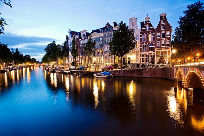 Amsterdam: Wine and Cheese Evening Cruise - Bridges and Golden-Age Houses: The Part That Looks Best After Dark