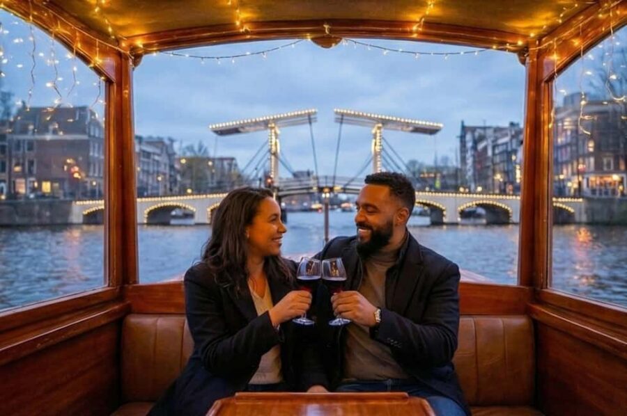 Amsterdam:1.5-Hour Canal Cruise local Guide, Drinks & Snacks - What You Get Onboard: Heineken, Wine, Soda, and Dutch Snack Plates