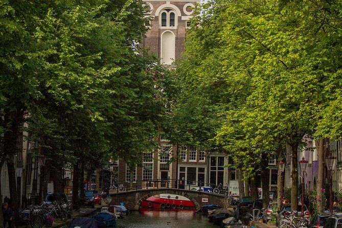 Anne Frank Private Bike Tour in Amsterdam - Spinoza Monument: a short stop that breaks the rhythm