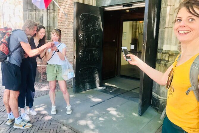 Discover Amsterdam's city center in this Outside Escape game tour - Nieuwezijds Voorburgwal 258: stately canal houses that tell the water story