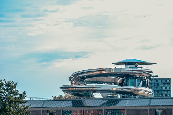Discover Rotterdam: Classic Highlights Bike Tour with a Local - Veerhaven shipping quarter and what the fountain symbolizes