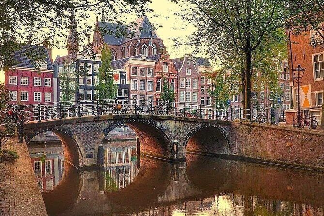 Dutch Pancake City Centre Canal Cruise - Bridges, stonework, and a performance venue built for opera and ballet