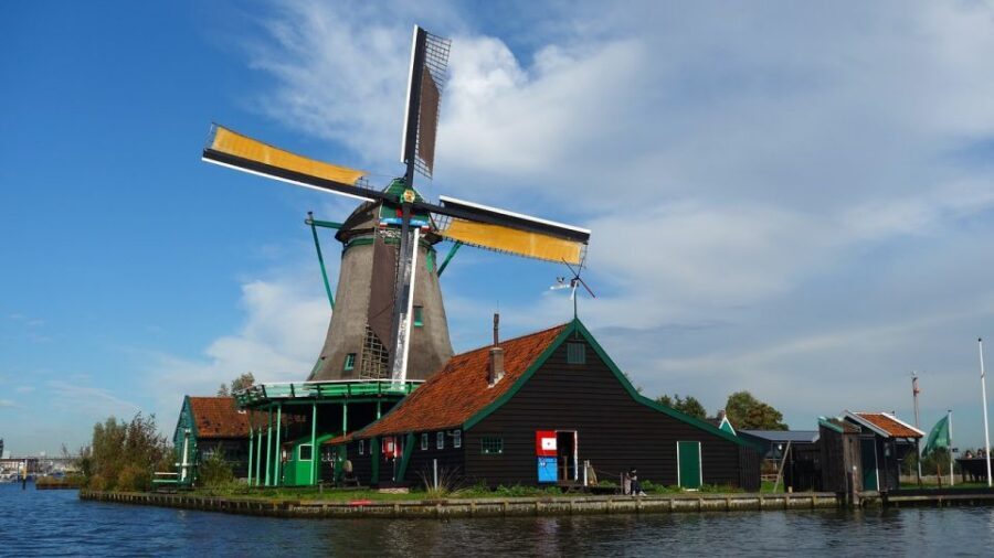 From Amsterdam: Windmills, Volendam, & Marken Private Tour - Volendam harbor and seafood lunch: the village feel in one hour