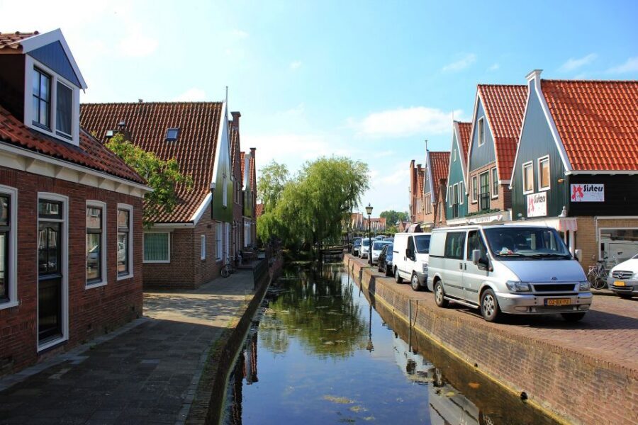 From Amsterdam: Windmills & Volendam Private Tour - Volendam: Fish, Old Ships, and a Dyke Walk