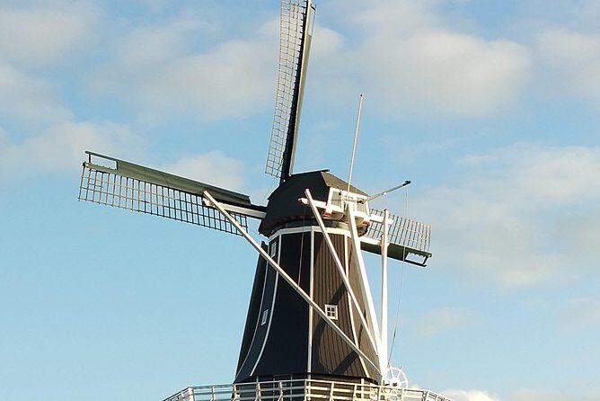 Haarlem Walking Tour. Unknown and Surprising - Molen De Adriaan and Bakenesserkerk: windmill and church time