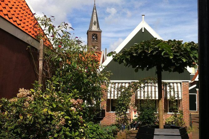 Half-Day Edam and Volendam Private Walking Tour from Amsterdam - Old hofjes courtyards: from medieval charity to modern social housing