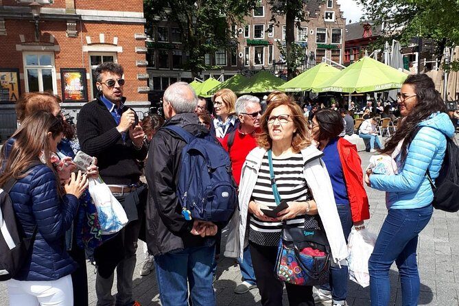 Historical tour of Amsterdam with Italian guide - Dam Square, Flower Market, and Leidseplein: breaks that also teach you how Amsterdam lives