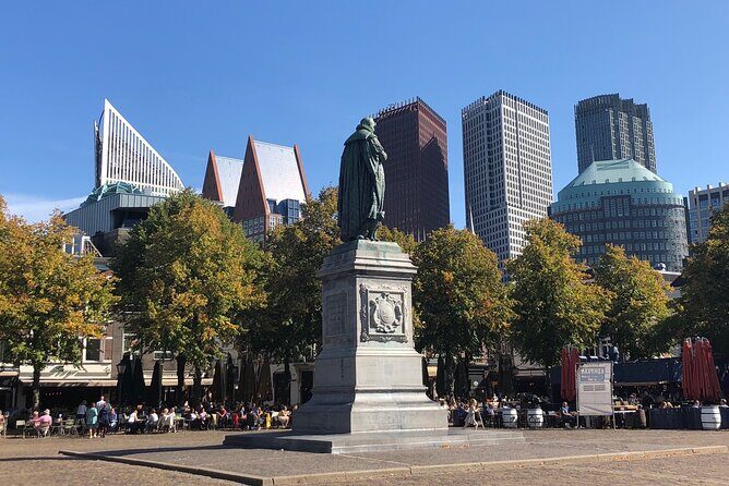 Holland Four City Charm Tour - Private Day Tour - Delft Stop: Cobblestones, Canals, and William of Orange’s Burial Church