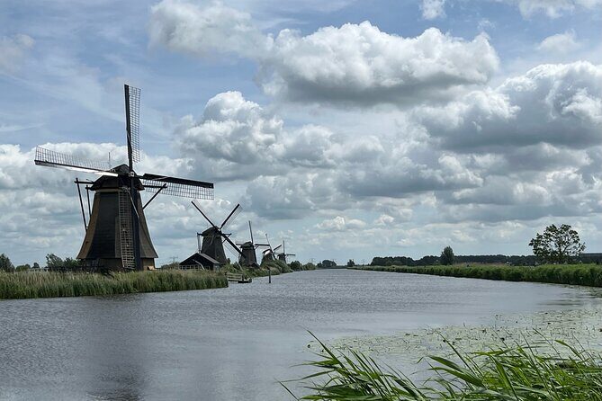 Kinderdijk Windmills, Delft City & Delft Blue Factory Visit - Delft on foot: cobblestones, canals, and a guide who keeps it real
