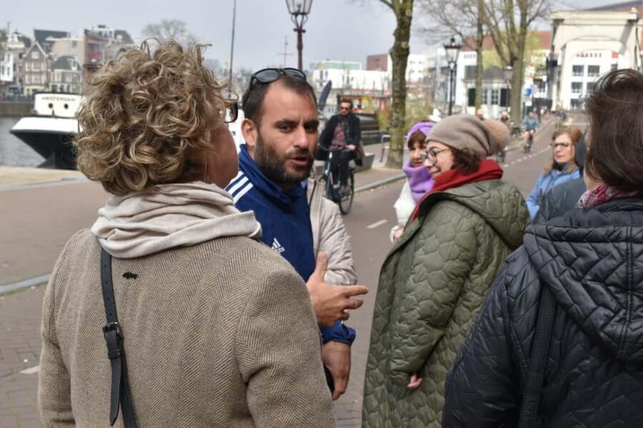 Liberal Amsterdam: Small-Group Walking Tour & Anne Frank VR - Tony’s Chocolonely Super Store and the bridge-to-history contrast