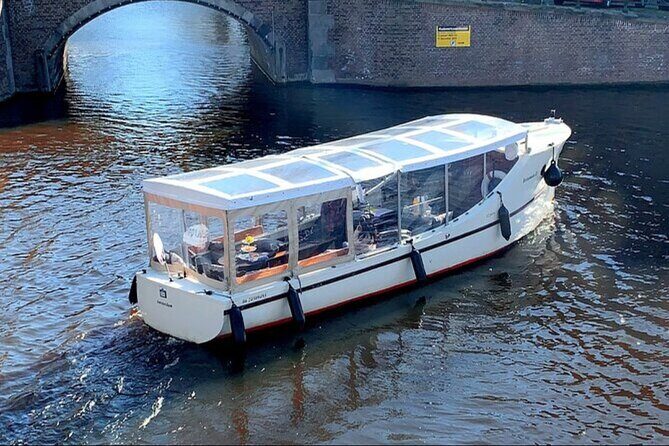 Luxury Amsterdam Canal Cruise – Unlimited Cocktails Included (1H) - A 1-Hour Canal Cruise That Hits Amsterdam’s Best Angles