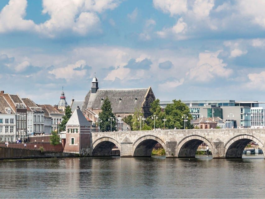 Maastricht: Culinary Walking Tour with Tastings - Your Tasting Lineup: Vlaai, Chocolates, Wine, Cookie, and Sour Meat