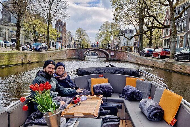 Private 90 Minute Amsterdam Canal Belt Exploration Cruise - Skinny Bridge and the Prinsen return: finishing with a memorable wooden-bridge moment