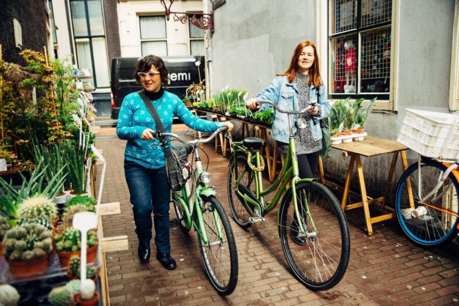 Private Amsterdam Bike Tour with a Local - Graffiti stories: the oldest house and the blood graffiti house