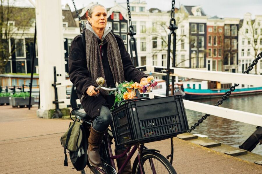 Private Amsterdam Bike Tour with a Local - Canal lanes, West-Indisch Huis, and Torensluis at street level