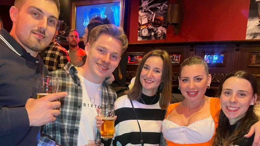 Private Bar Tour with Bar Maid Guide Amsterdam Red Light - What happens at each stop: photos, quizzes, and a party pace