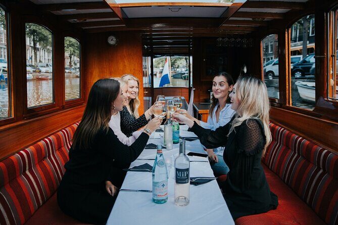 Private Canal Cruise in Amsterdam - Major rail and the canal-side story: Centraal Station and Anne Frank House