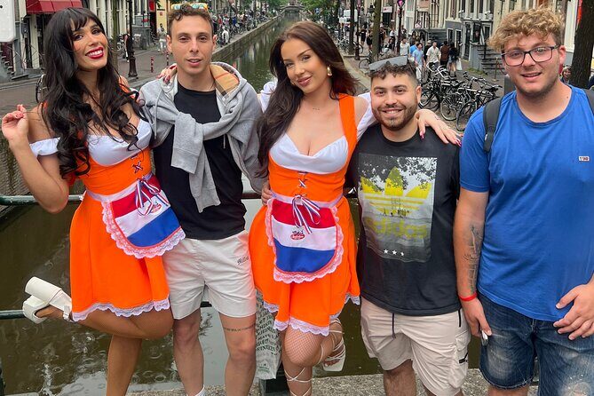 Private Hostess Bar Tour in Amsterdam Red Light District (3h) - The 1.5-hour De Wallen crawl: 4 bars, free shots, games, and shows