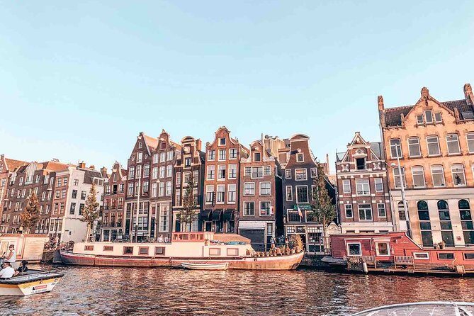 Private Romantic Canal Cruise Amsterdam with Bubbly and Snacks - UNESCO Canal Belt to Golden Belt: 400 years of canal living, from a couple’s angle