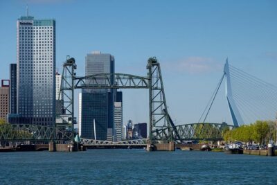 Private Transfer from Rotterdam to Amsterdam - What the pickup feels like in Rotterdam: hotel lobby, luggage help, and a suit