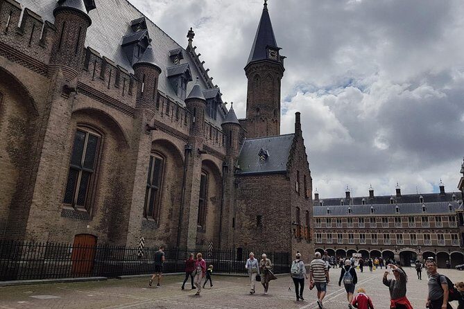 privatetour Delft, The Hague&Rotterdam Kinderdijk from Amsterdam - Koninginnenhoofd and Hotel New York views
