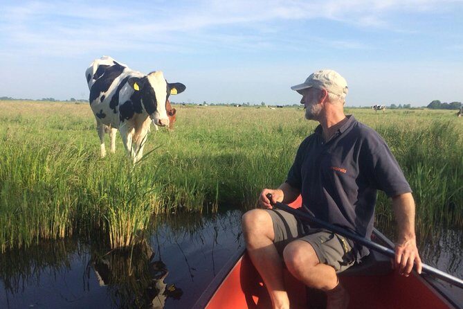 Small-Group Guided Sunset Canoe Tour in Waterland with Dinner - The canoe portion: reed beds, meadows, and wooden houses