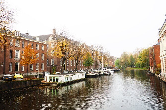 Small Group Hidden Gems Tour in Amsterdam - Stop 2: Finding Spinoza at the Monument