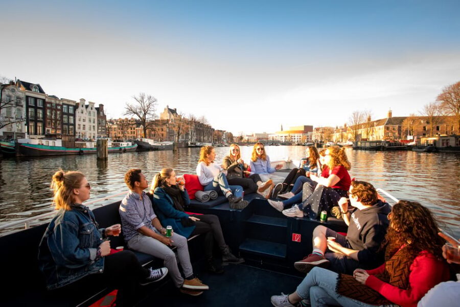 Small-Group Walking Tour with Amsterdam Canal Cruise - Zuiderkerk, Begijnhof, and Flower Market Moments