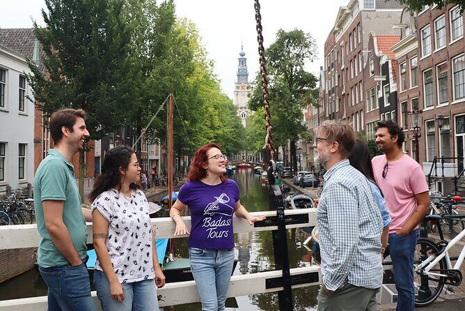 Small-Group Women's History Tour in Amsterdam - Dam Square: hustle, cameras, and a tasteful scandal