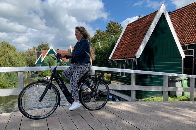 Visit Amsterdam Countryside with windmills by bike - Wet meadows, dikes, and meadow birds from the bike
