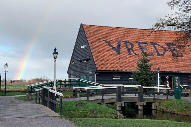 Visit Amsterdam Countryside with windmills by bike - Pedaling back and the boat ride home