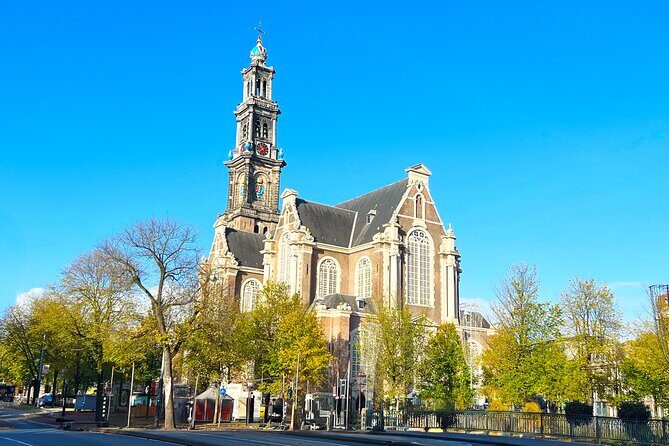 Walking Tour about Golden Age Architecture, private local guide - Westerkerk spire finale: Calvinist simplicity, Rembrandt’s connection, and the clock chimes