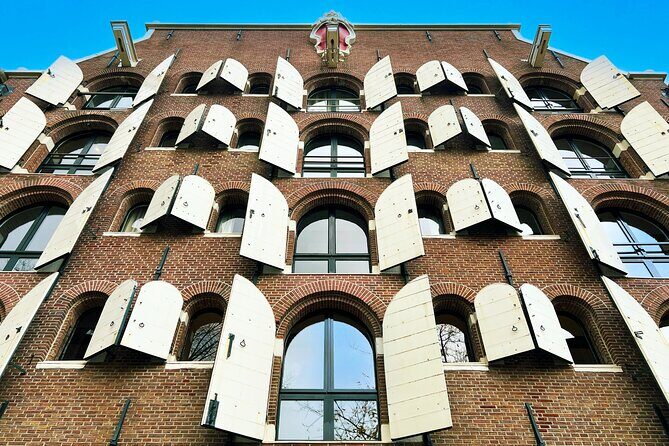 Walking Tour about Golden Age Architecture, private local guide - Huis Bartolotti and De Dolphijn: reading canal-belt wealth in red brick