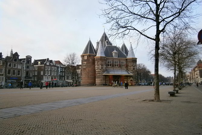 Walking tour of 2 hours of the highlights of Amsterdam - Dam Square: The Central Stage of Amsterdam
