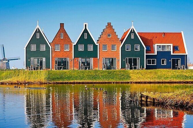 Zaanse Schans Edam Volendam Private Day Tour from Amsterdam - Volendam promenade, herring, and a family smokehouse dinner
